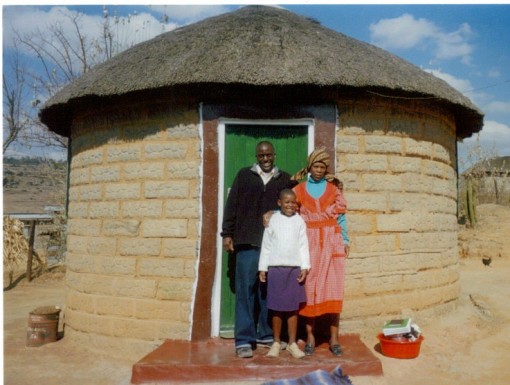 Byron L. Williams with host family in Lesotho (host sister Nthumi Nthako and host mother MaThabiso Nthako) in Leribe, Lesotho.